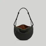 Structured bottom view of the black crescent bag highlighting the 7.5 cm wide gusseted base