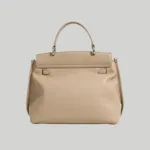 Beige minimalist professional commuter handbag back view detailing top handle stitching
