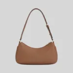 Angled back view of minimalist brown leather hobo bag for urban commuters