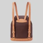 Wholesale two-tone leather backpack back view showing adjustable tan straps and brass buckles.