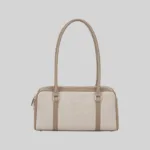 Front view of a beige structured double-zip handbag with long shoulder straps