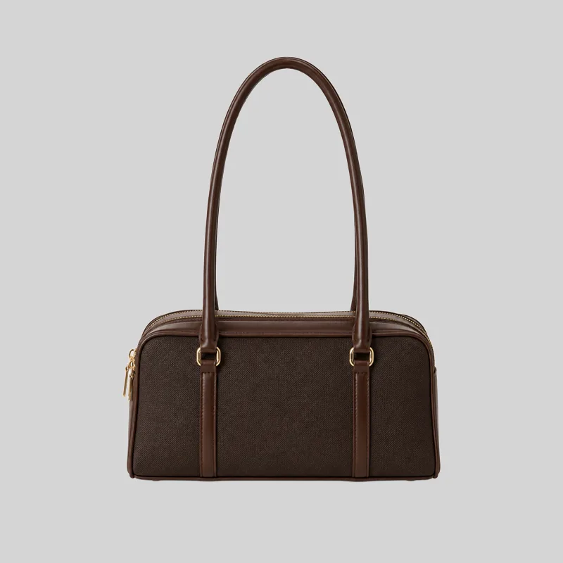 Front view of a dark brown structured double-zip handbag with long shoulder straps