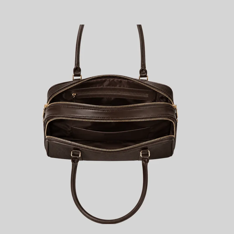 Top open view of the dark brown shoulder bag showing dual compartments, interior lining, and zip pockets