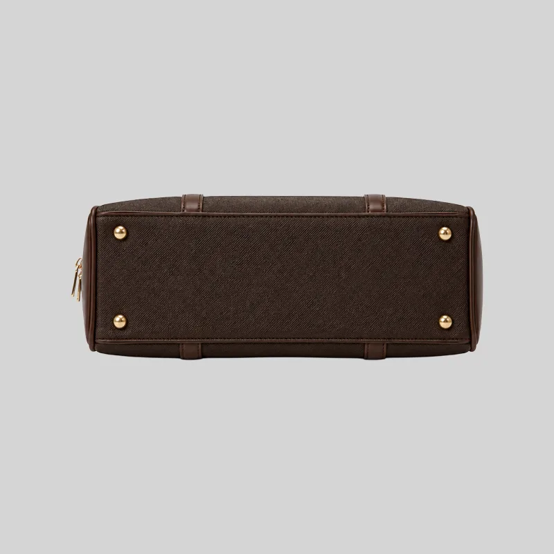 Top open view of the shoulder bag showing dual compartments, interior lining, and zip pockets, dark brown