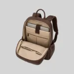 Open interior view of the vegan commuter backpack revealing a dedicated padded laptop sleeve