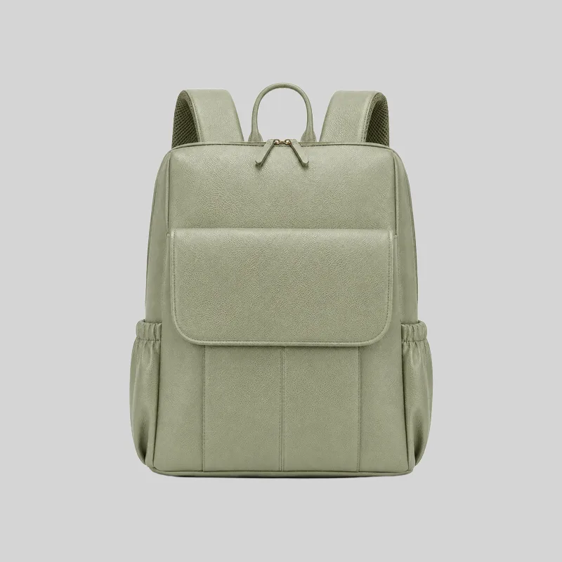 Front view of the sage green pebbled vegan leather laptop backpack featuring a structured silhouette